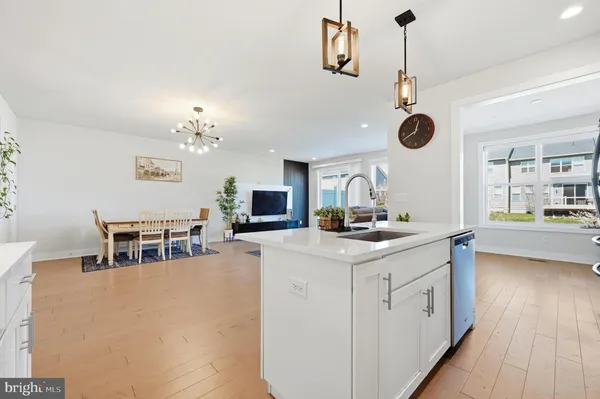 a kitchen with a counter space a sink and appliances