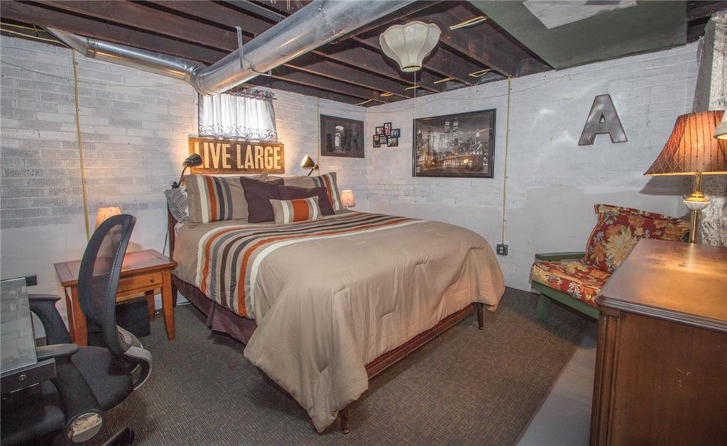 307 Darlington Road Beaver Falls, PA 15010 - Photo 11 of 21 The Industrial look is acccomplished in this lower level bedroom space creatively set up and fully functional!