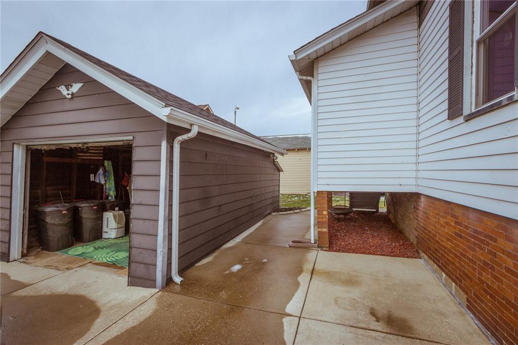 307 Darlington Road Beaver Falls, PA 15010 - Photo 21 of 21 A single stall, overiszed garage has extra storage in the rear and the concrete offers parking for 3 cars plus enough patio space for your outdoor relaxation and grilling!