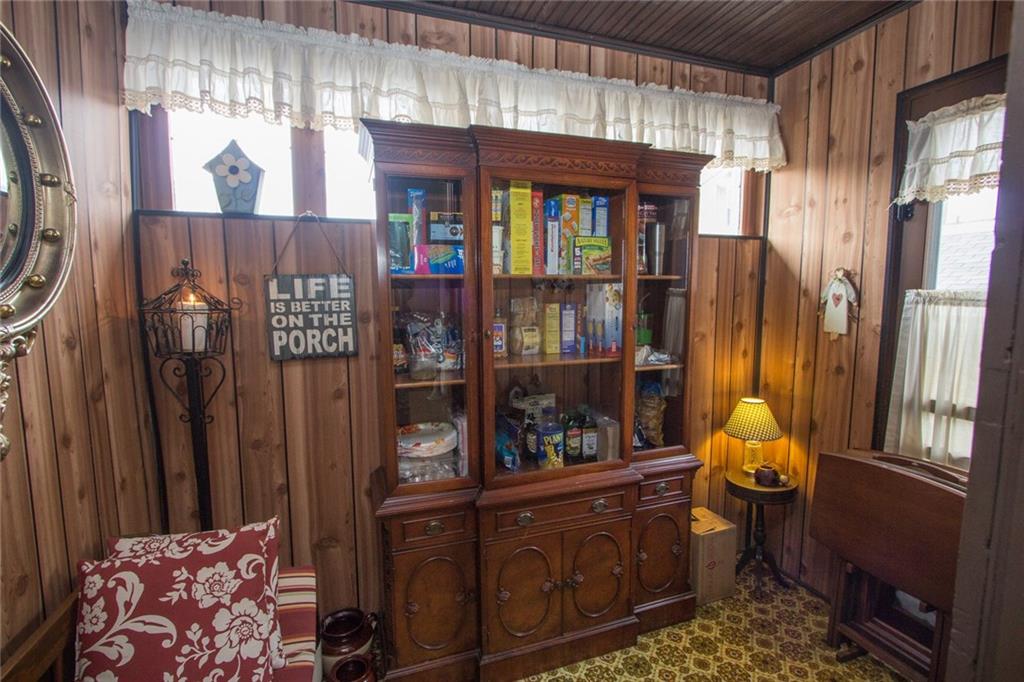 307 Darlington Road Beaver Falls, PA 15010 - Photo 9 of 21 The Bonus Room stays comfortable in the Winter with the door from kitchen left open. It offers a getaway reading area and additional storage. Access to the side/rear patio and garage as well!