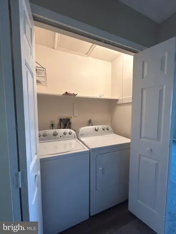 a view of washer and dryer with a window