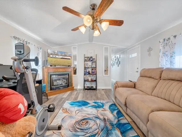 a swimming pool with an outdoor space and seating area