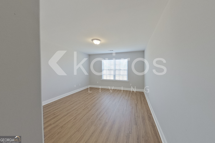 228 Western Red Cedar Drive Springfield, GA 31329 - Photo 19 of 27 a view of wooden floor in an empty room