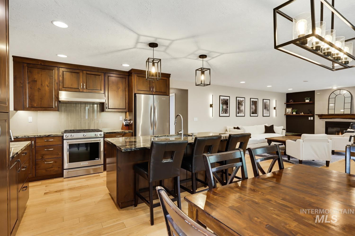 369 South Winthrop Way Boise, ID 83709 - Photo 19 of 50 Open-concept living space featuring wood-finish flooring