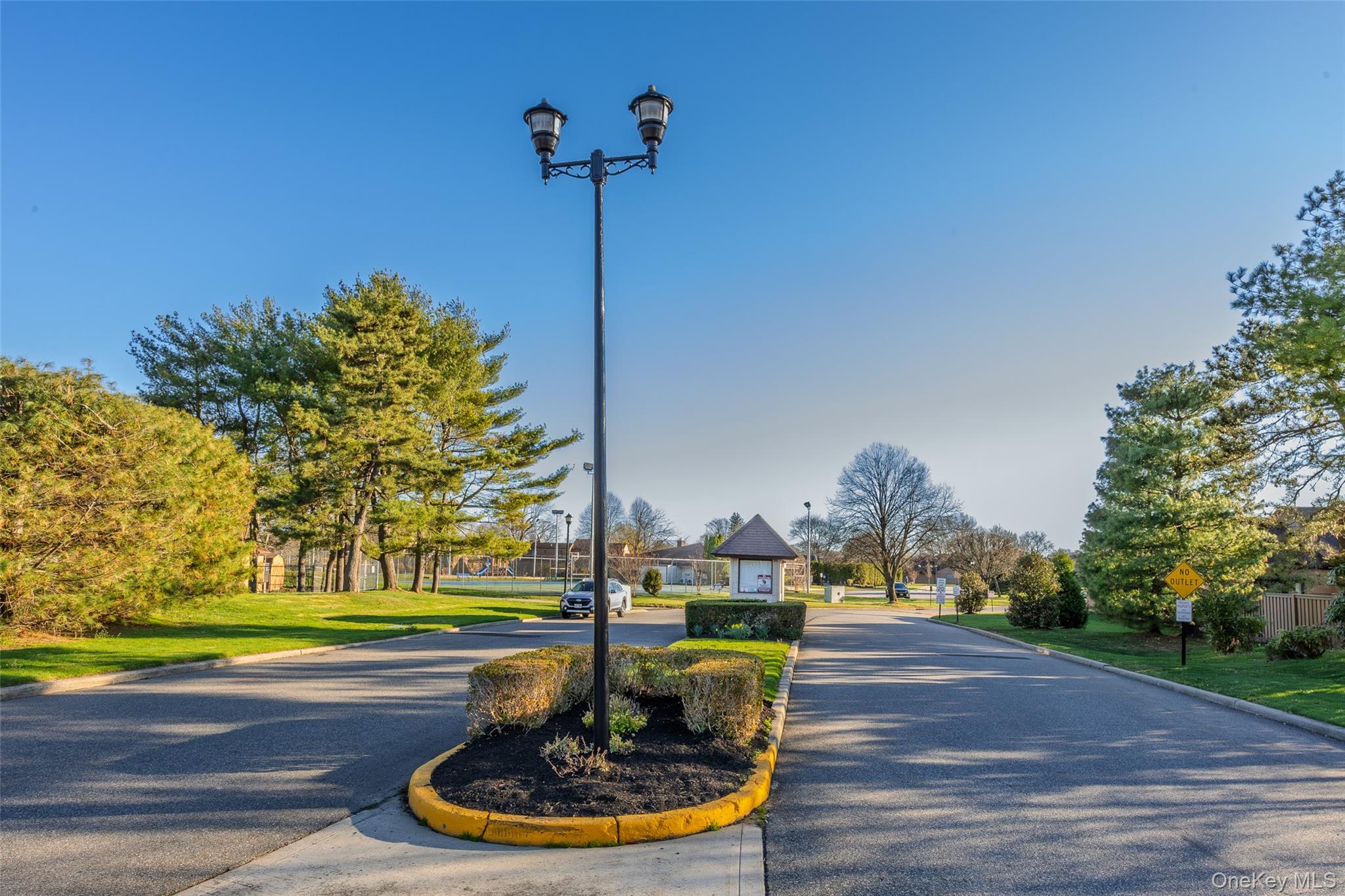 117 Scarlett Way Commack, NY 11725 - Photo 24 of 26 Community Entrance