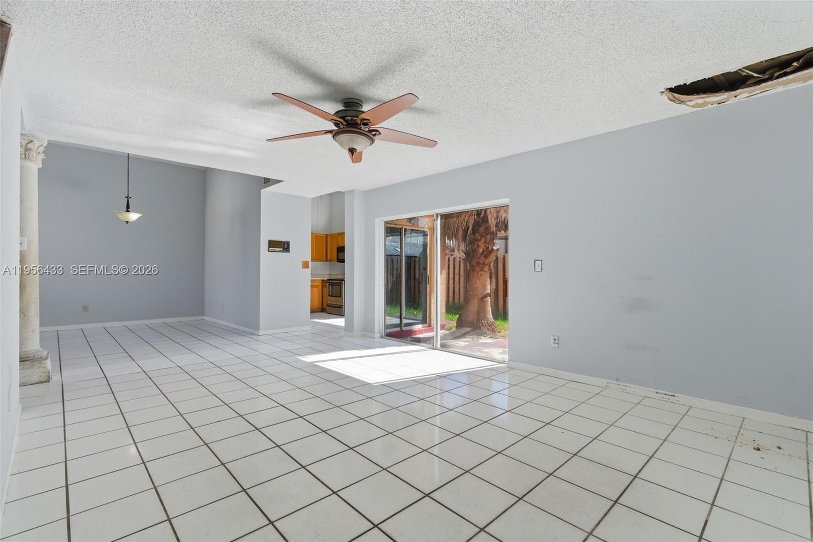 15804 Southwest 112th Terrace Miami, FL 33196 - Photo 13 of 46 a view of an empty room and window
