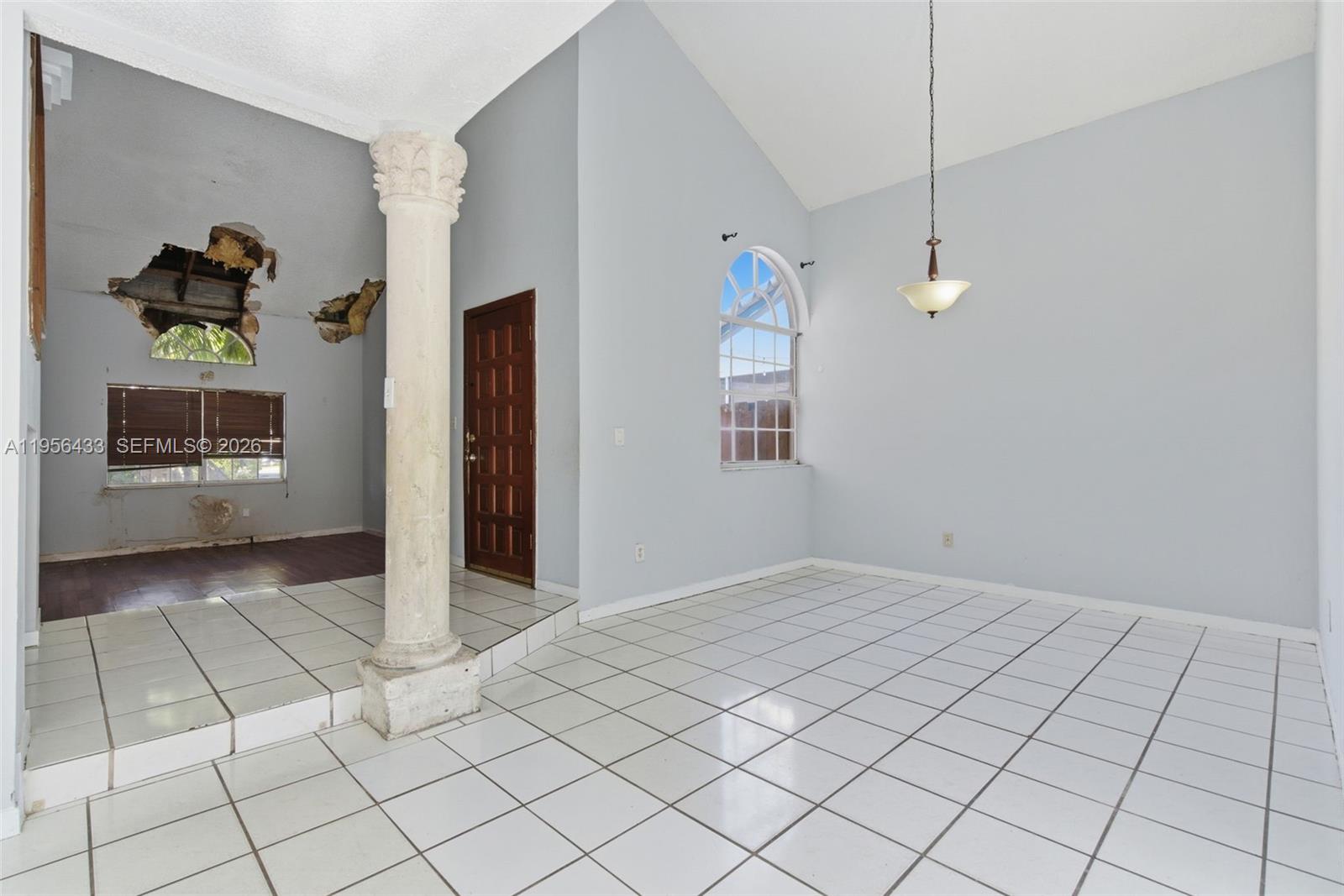 15804 Southwest 112th Terrace Miami, FL 33196 - Photo 16 of 46 a view of an empty room and window