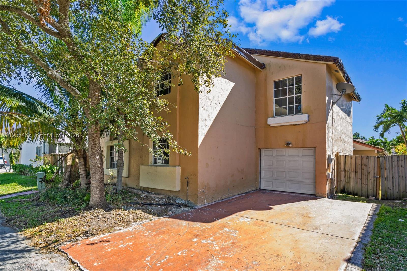 15804 Southwest 112th Terrace Miami, FL 33196 - Photo 2 of 46 a view of a house with a yard