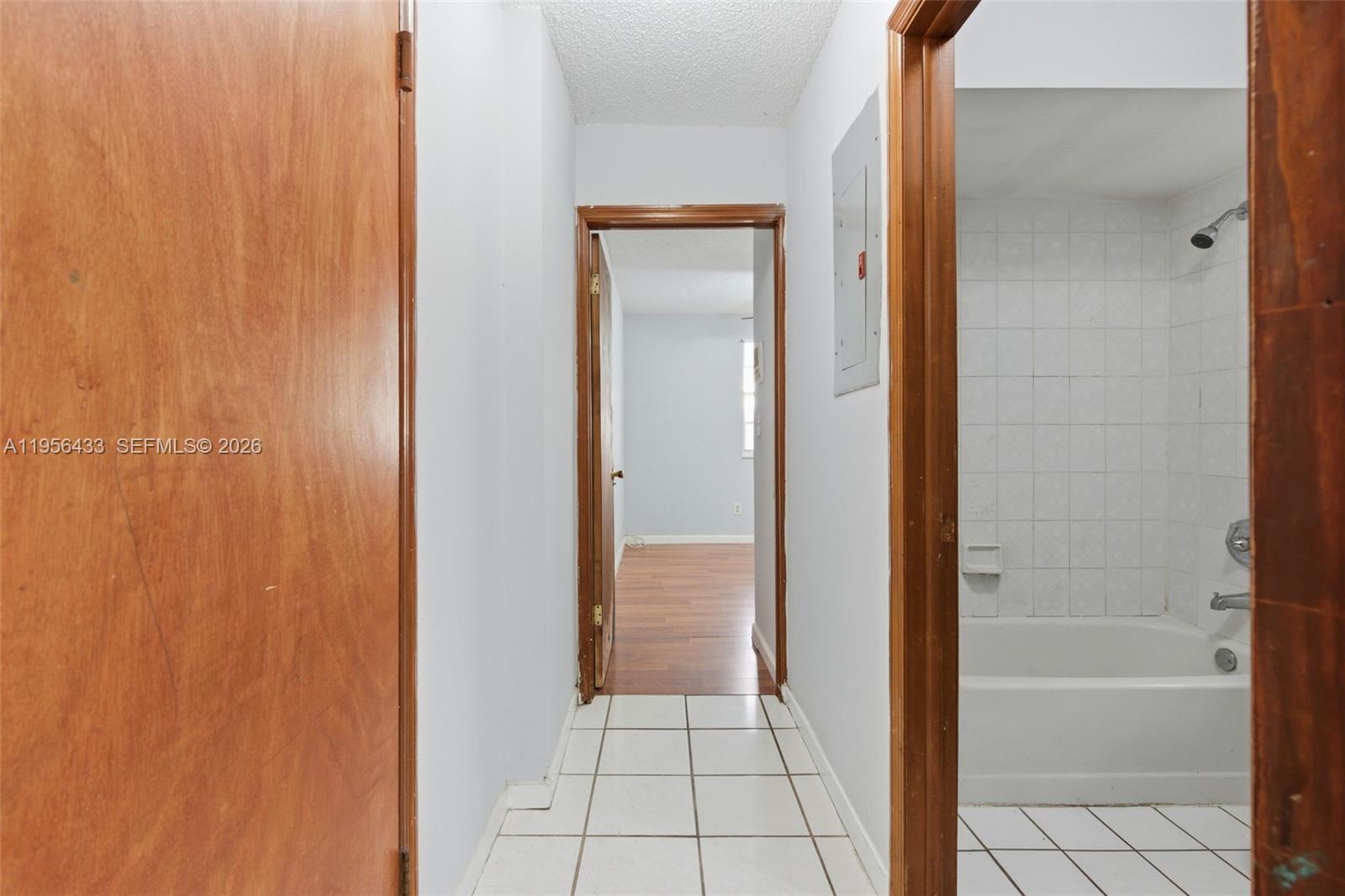 15804 Southwest 112th Terrace Miami, FL 33196 - Photo 21 of 46 a bathroom with a bathtub