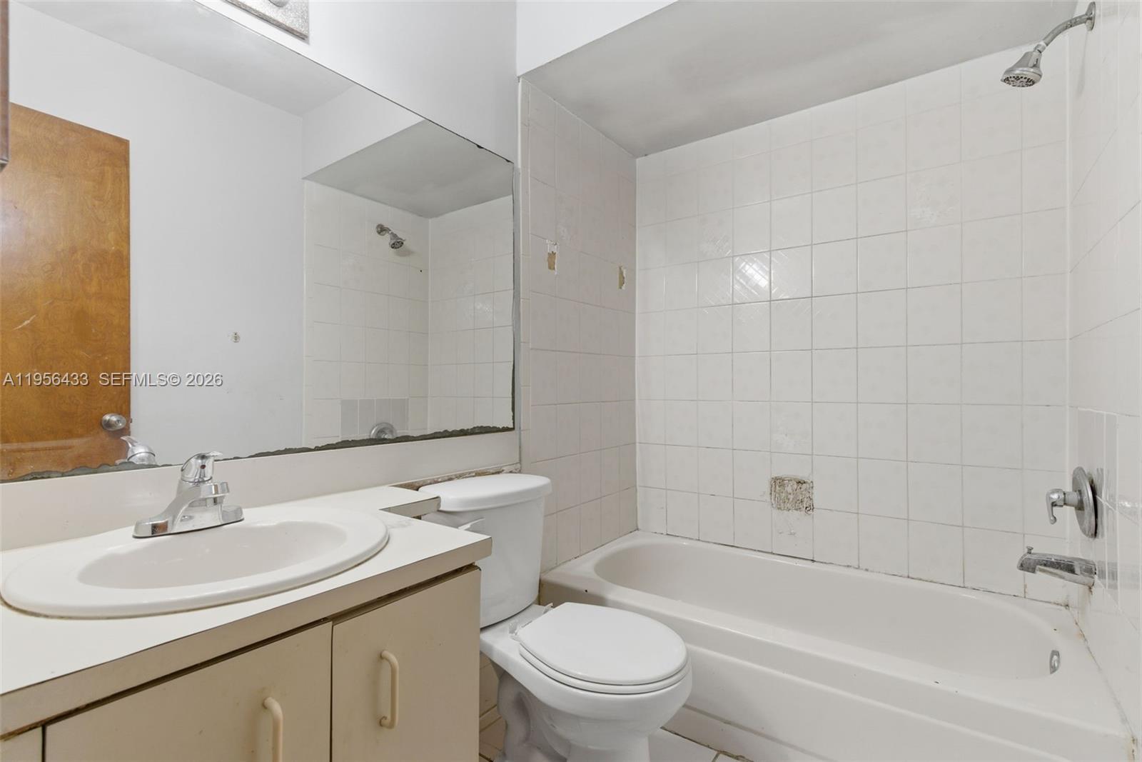 15804 Southwest 112th Terrace Miami, FL 33196 - Photo 38 of 46 a bathroom with a sink toilet and shower