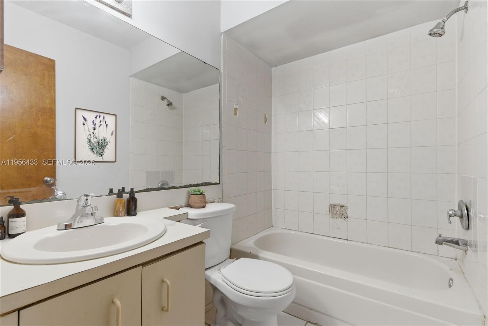 15804 Southwest 112th Terrace Miami, FL 33196 - Photo 39 of 46 a bathroom with a sink toilet and shower