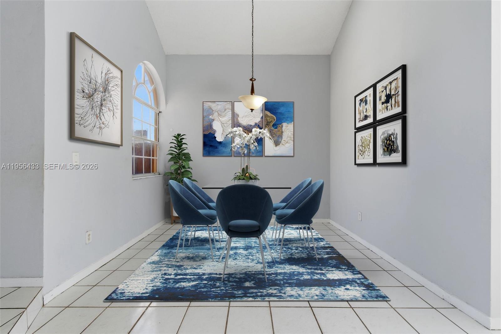 15804 Southwest 112th Terrace Miami, FL 33196 - Photo 9 of 46 a view of a dining room with furniture