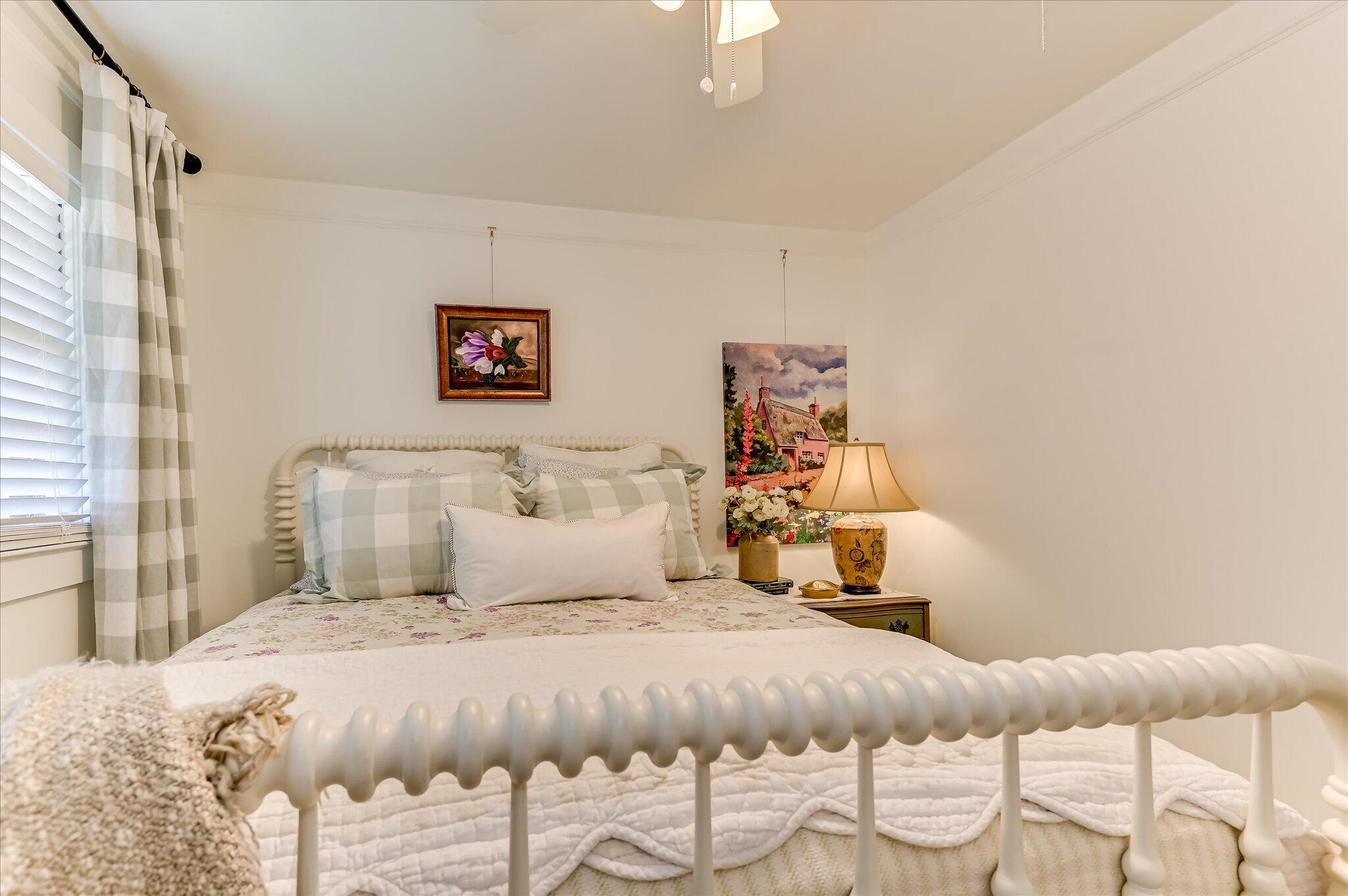 1121 Ridgecrest Avenue North Augusta, SC 29841 - Photo 32 of 42 a bedroom with a bed and a lamp