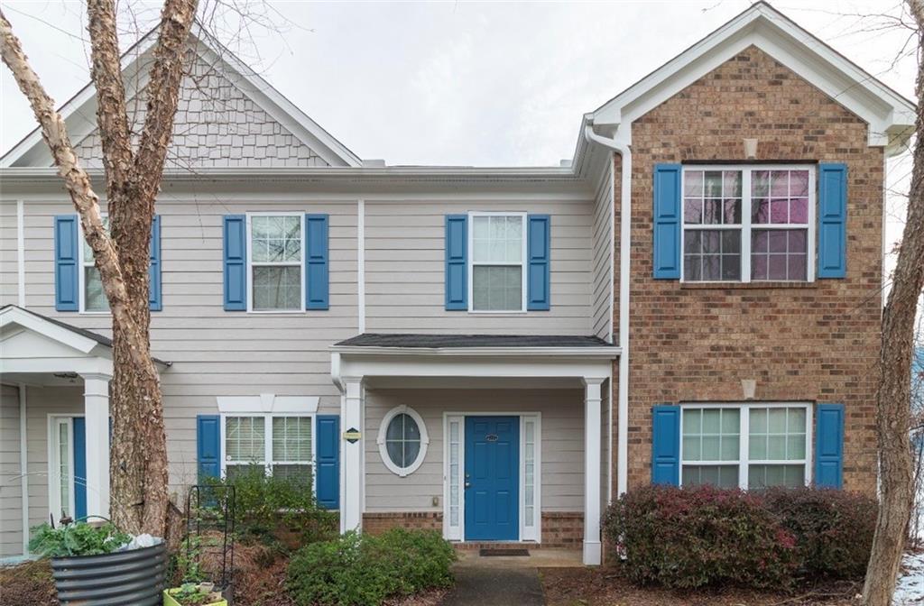 585 McWilliams Road Southeast, Unit 2301 Atlanta, GA 30315 - Photo 1 of 15 a front view of a house with plants