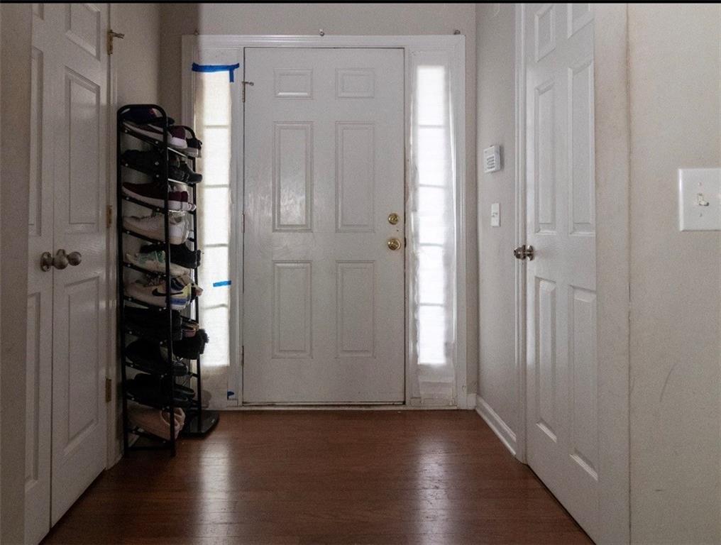 585 McWilliams Road Southeast, Unit 2301 Atlanta, GA 30315 - Photo 2 of 15 wooden floor in an empty room