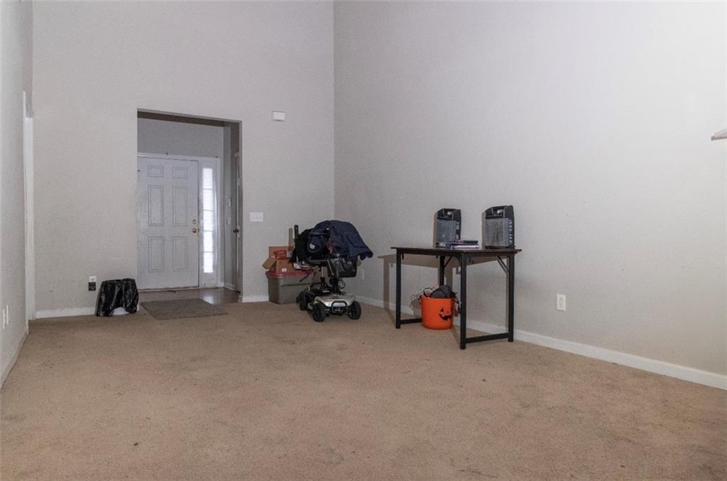 585 McWilliams Road Southeast, Unit 2301 Atlanta, GA 30315 - Photo 6 of 15 a view of a room with gym equipment