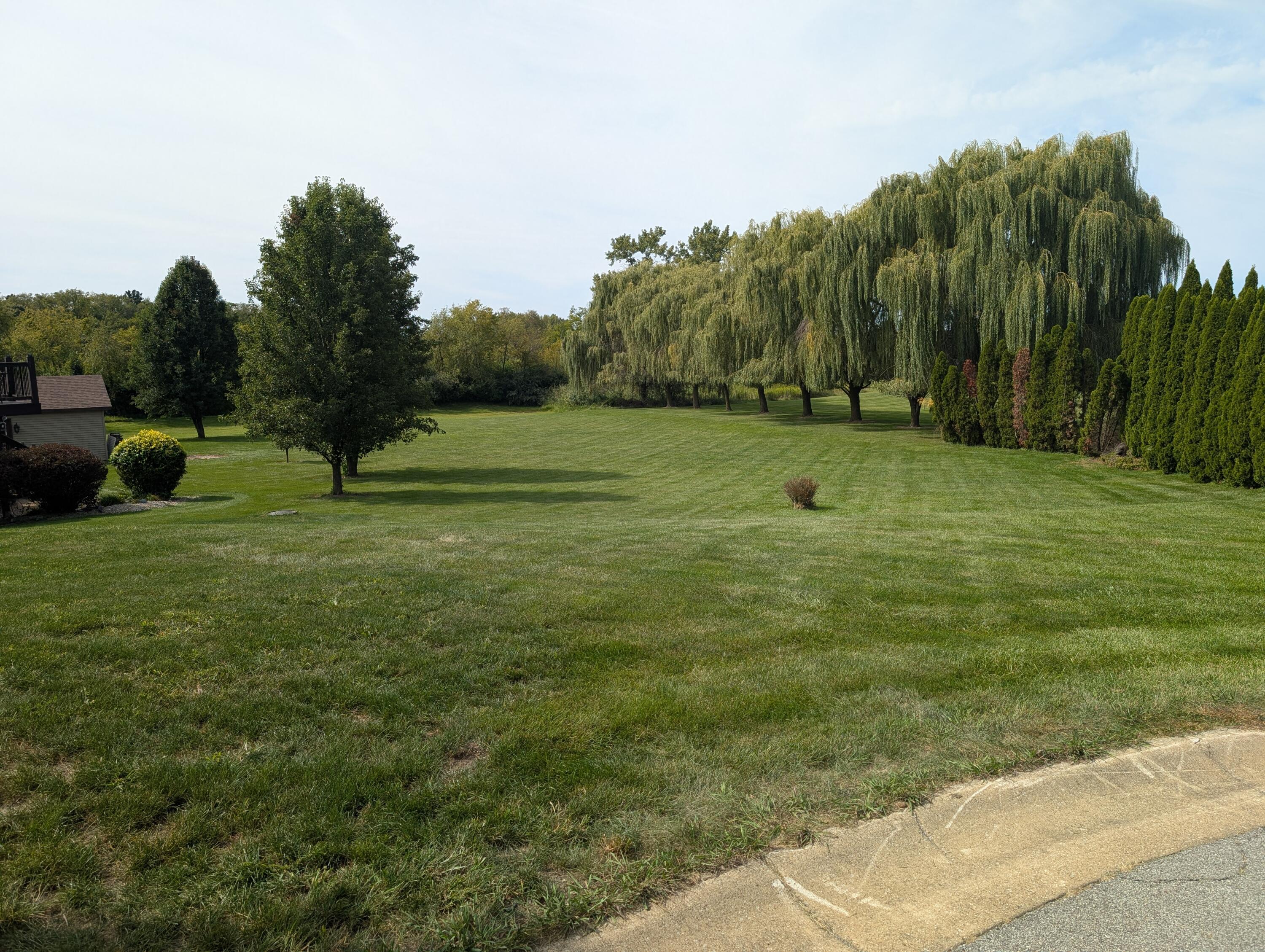 7873 East 99th Lane Crown Point, IN 46307 - Photo 4 of 5 a view of outdoor space with garden view