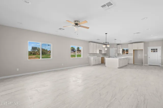 a view of a kitchen with furniture and a kitchen