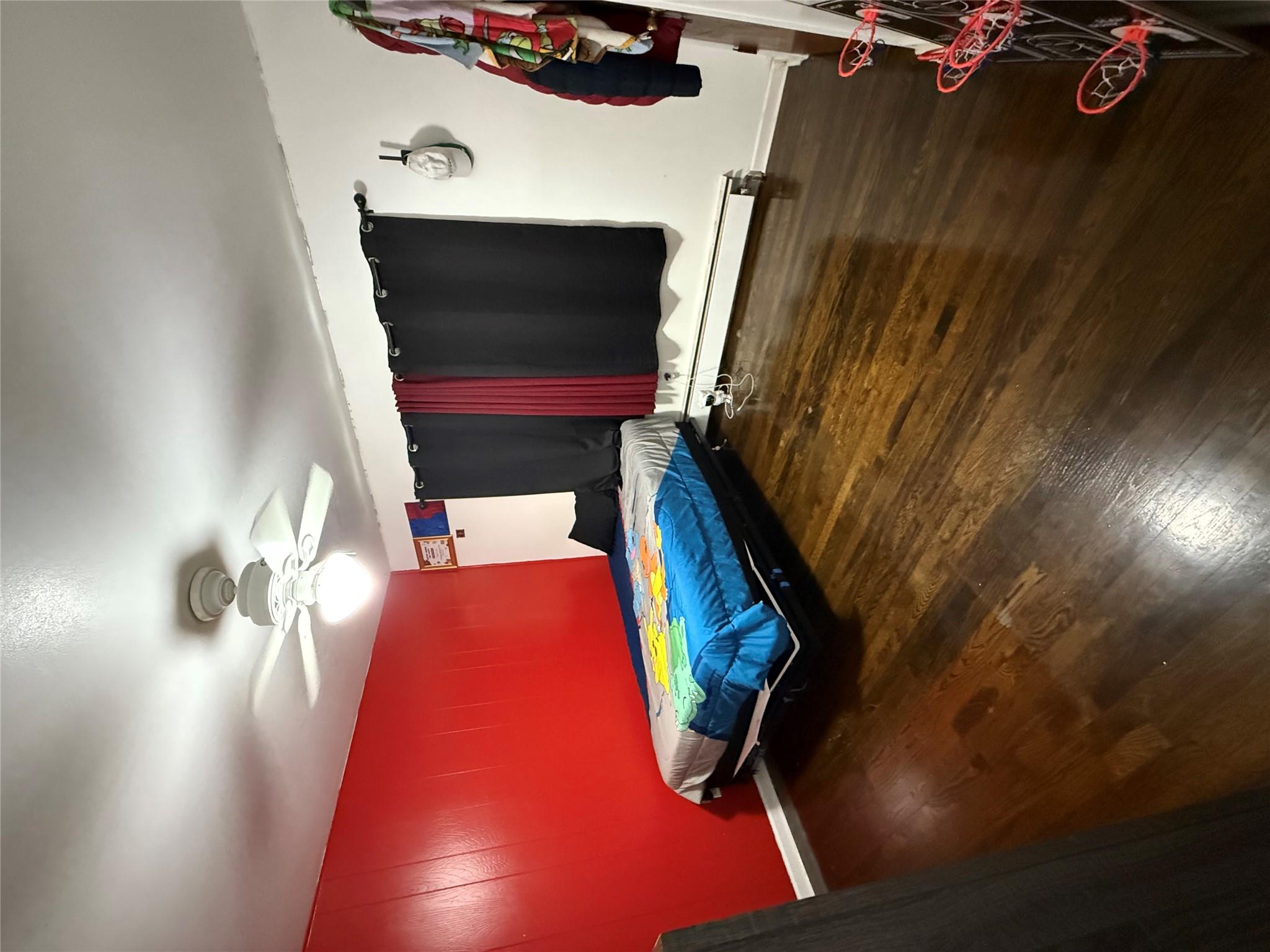 77 Upper Road Middletown, NY 10940 - Photo 11 of 18 Bedroom with wood finished floors, a baseboard heating unit, baseboards, and ceiling fan