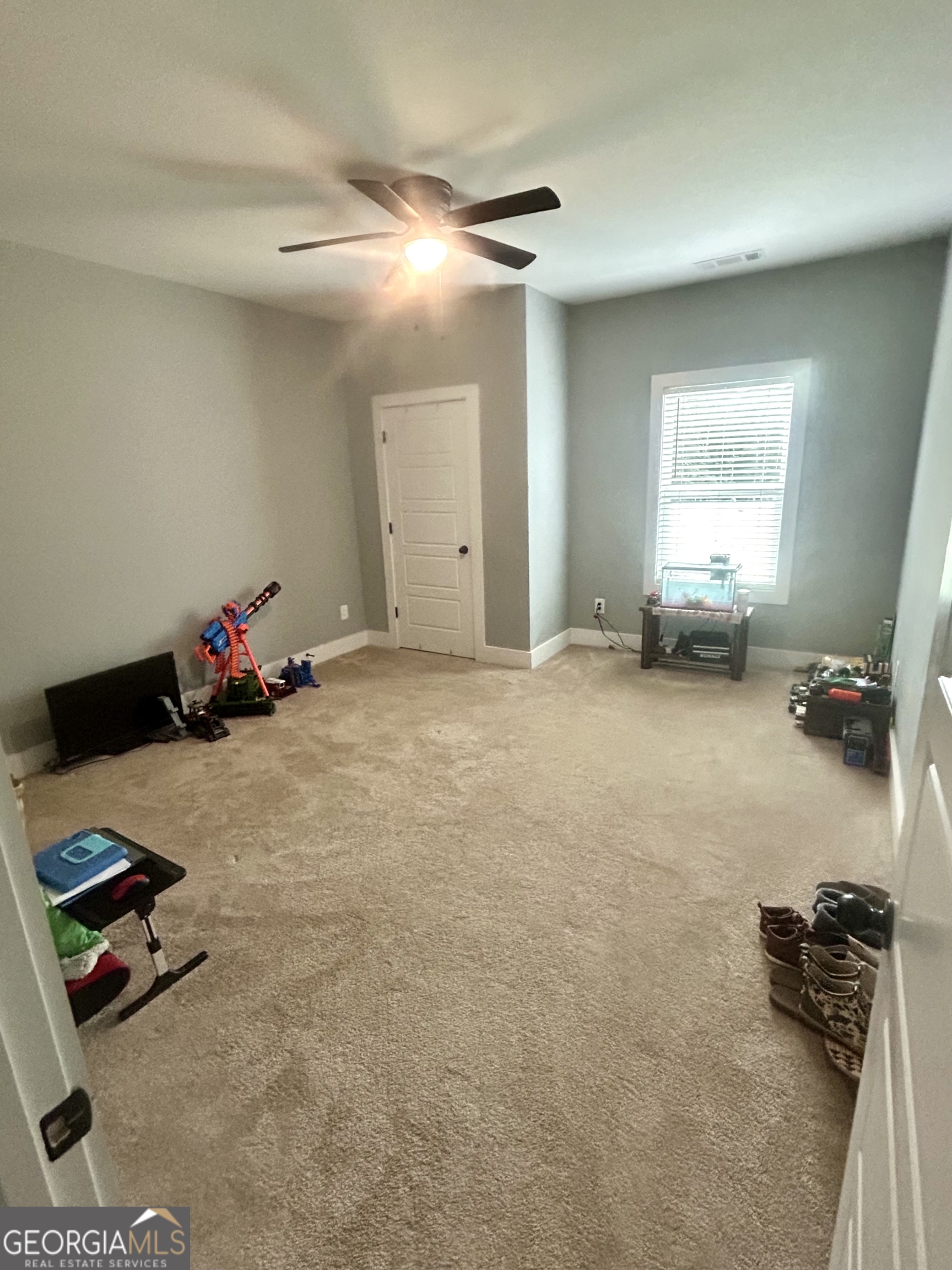 1250 Godfrey Road Madison, GA 30650 - Photo 29 of 42 a room with furniture and gym equipment