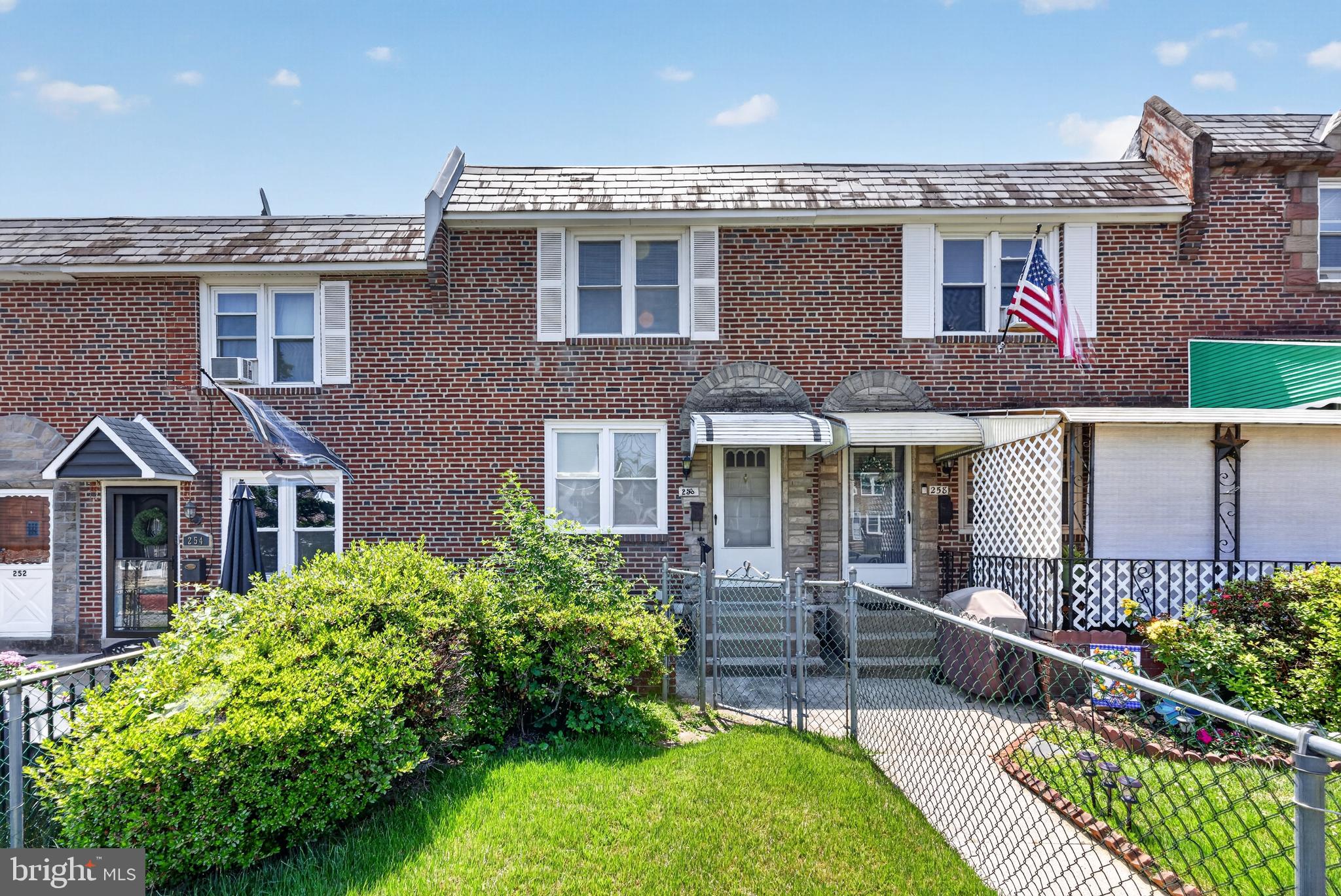 256 Cambridge Road Clifton Heights, PA 19018 - Photo 1 of 30 Charming brick home with lush greenery.