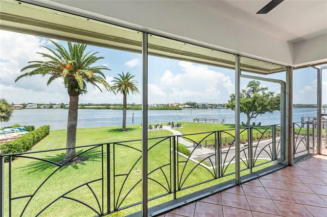 a view of swimming pool with outdoor seating