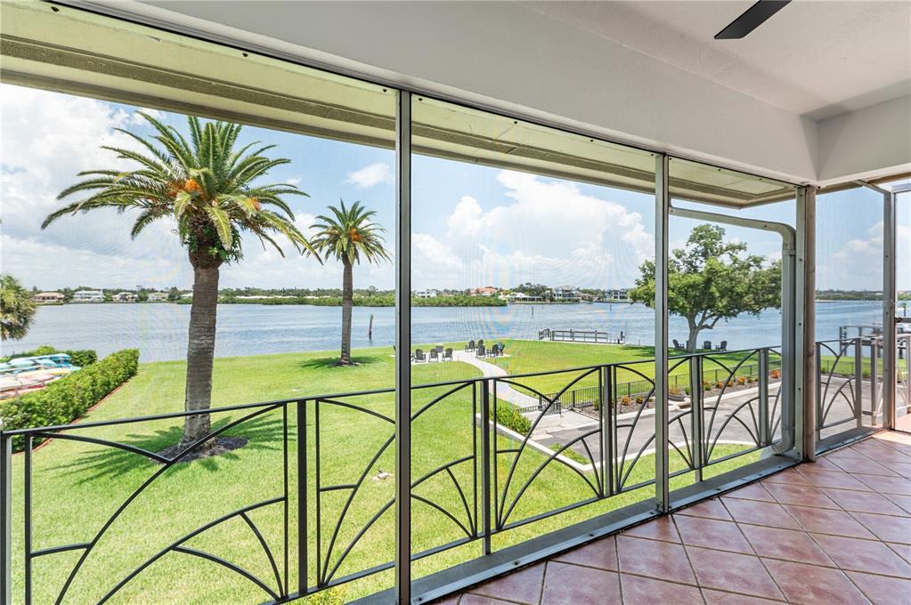 6005 Midnight Pass Road, Unit N13 Sarasota, FL 34242 - Photo 20 of 27 a view of swimming pool with outdoor seating