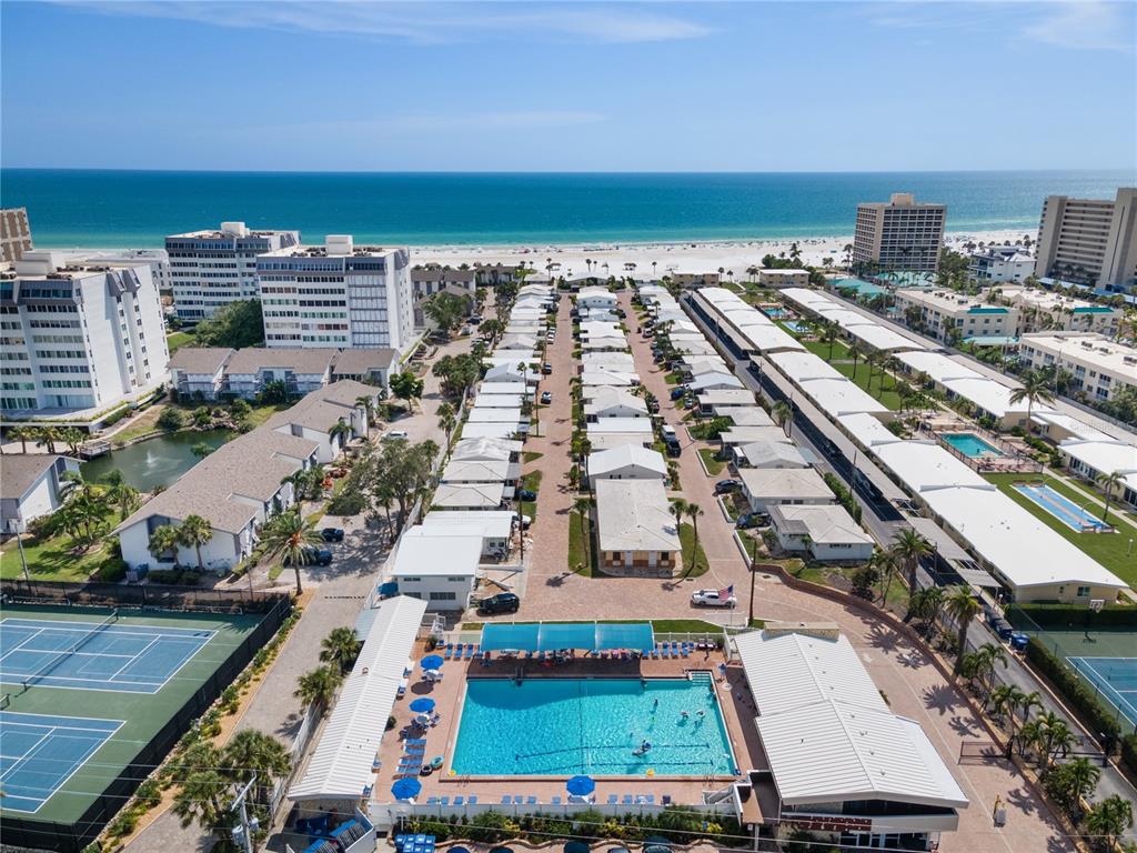 6005 Midnight Pass Road, Unit N13 Sarasota, FL 34242 - Photo 24 of 27 a view of a city with tall buildings