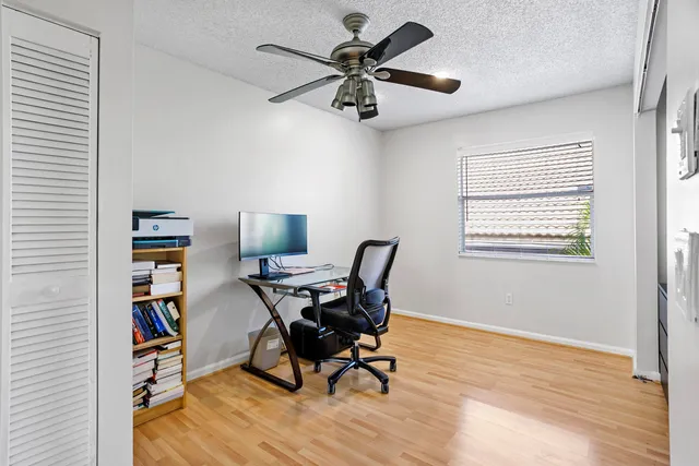 a workspace with wooden floor