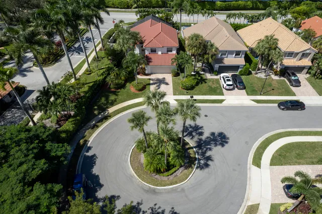an aerial view of a house with outdoor space