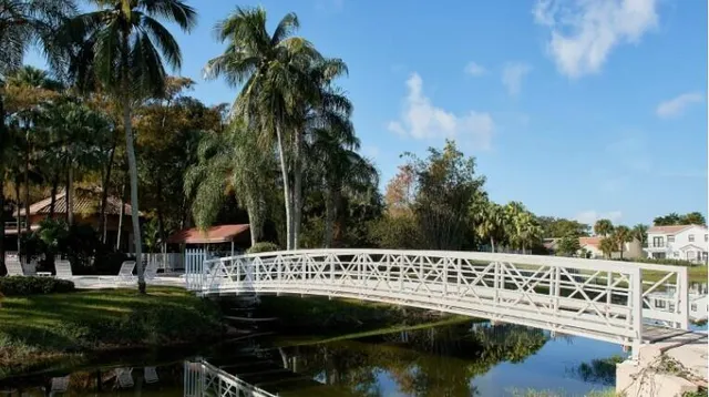 a room with gym equipment and floor to ceiling window