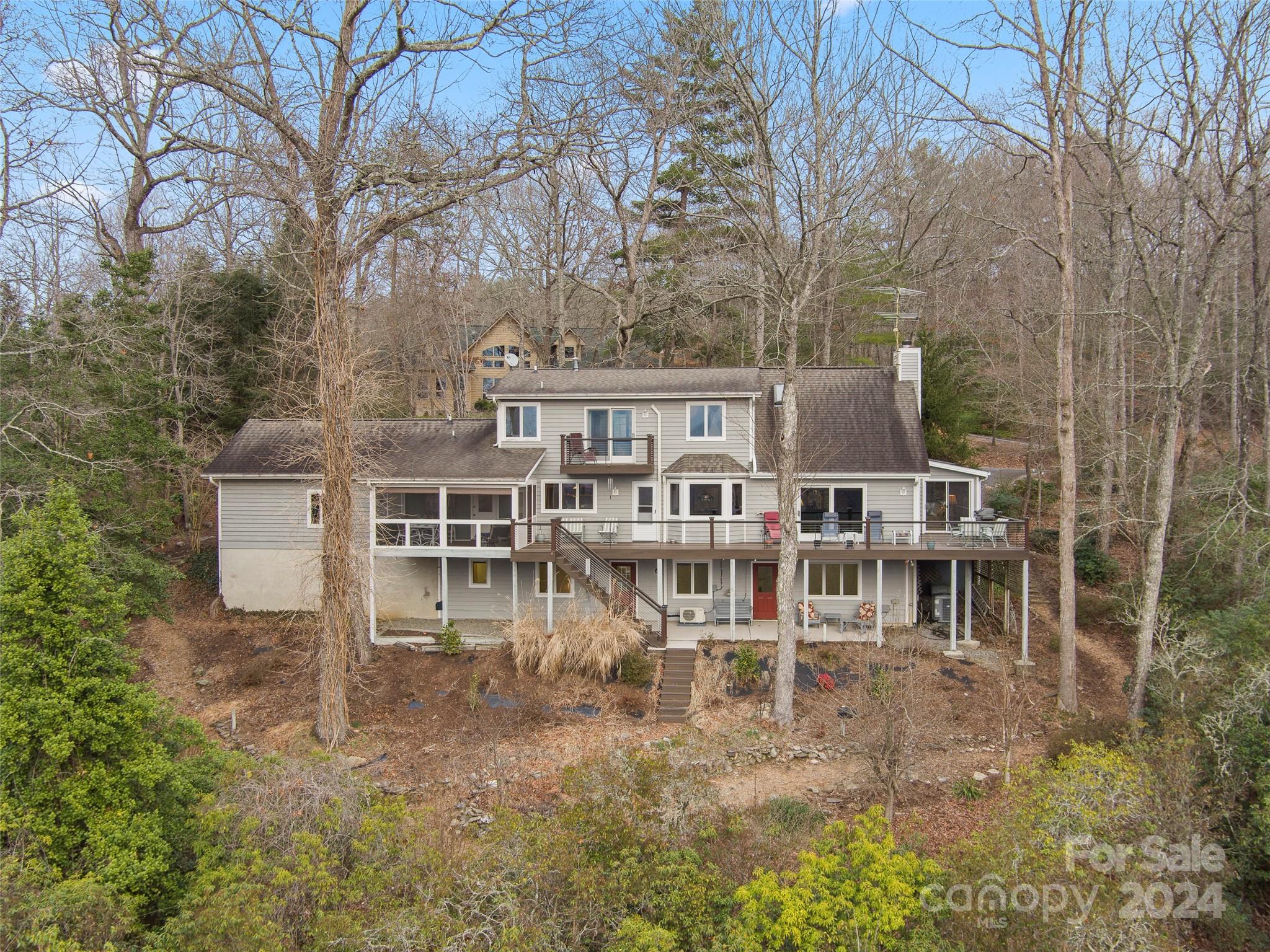 5571 Spring Road Hendersonville, NC 28739 - Photo 38 of 41 a view of a house with a yard
