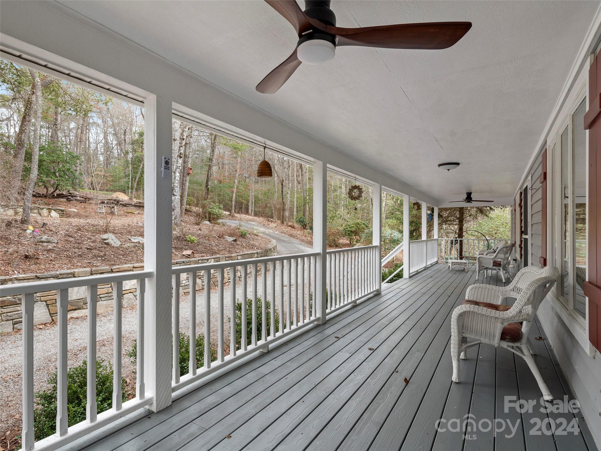5571 Spring Road Hendersonville, NC 28739 - Photo 6 of 41 a view of a living room with wooden floor
