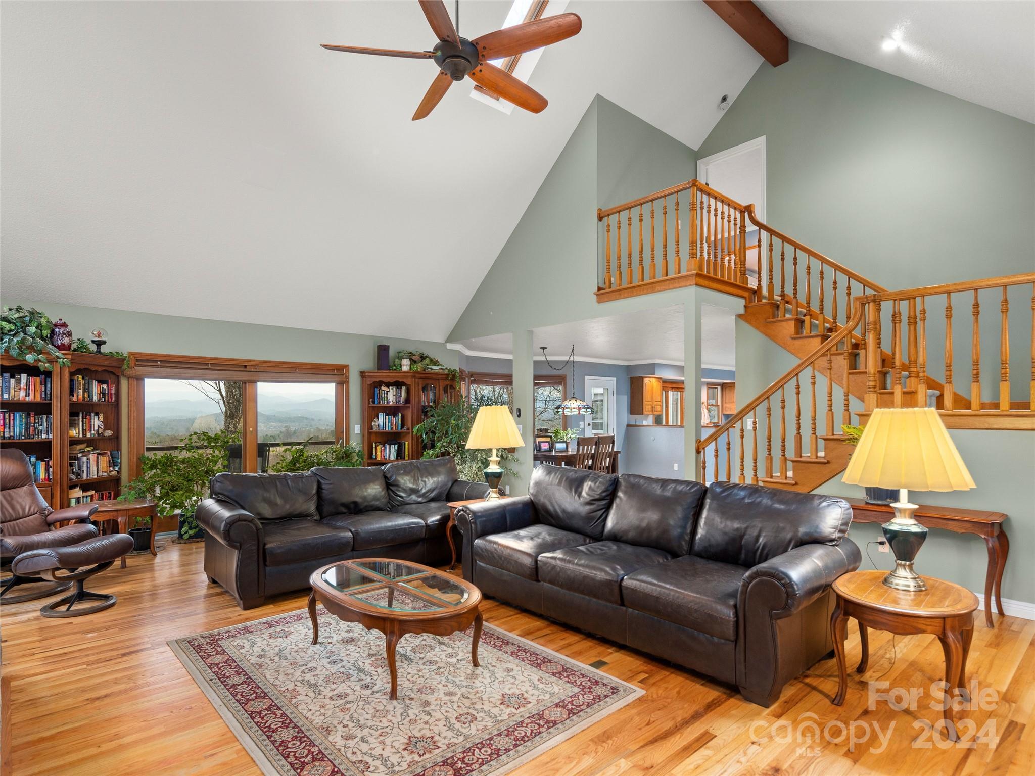 5571 Spring Road Hendersonville, NC 28739 - Photo 8 of 41 a living room with furniture and a rug