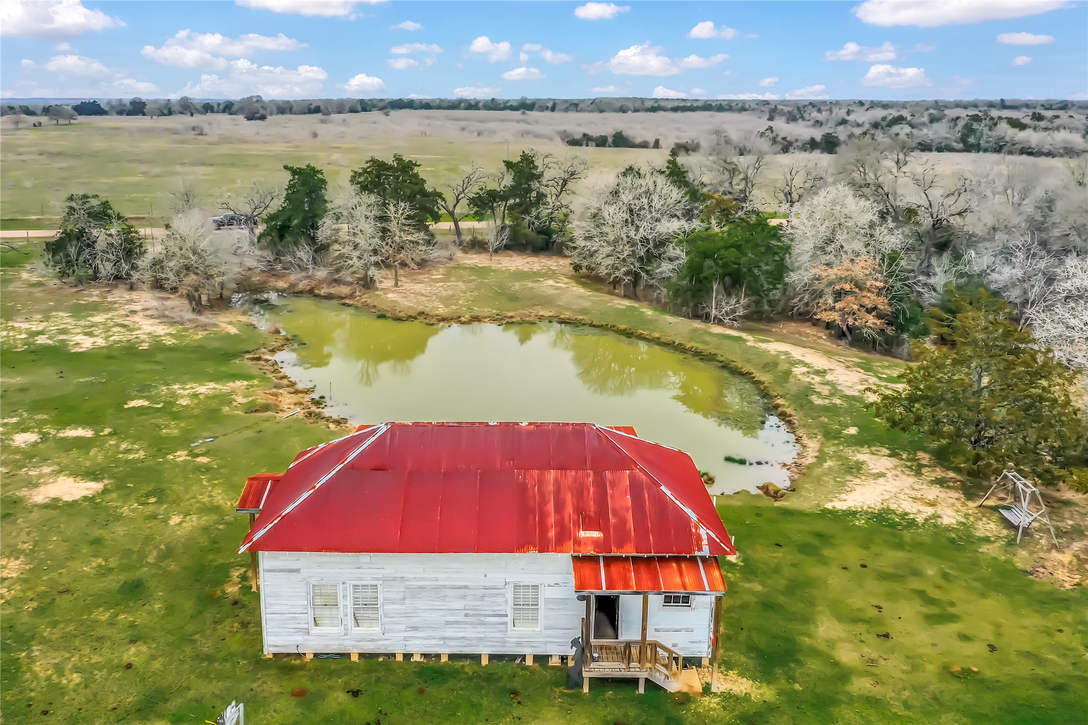 2810 West Old Lockhart Road Muldoon, TX 78949 - Photo 39 of 42 school house aerial w pond