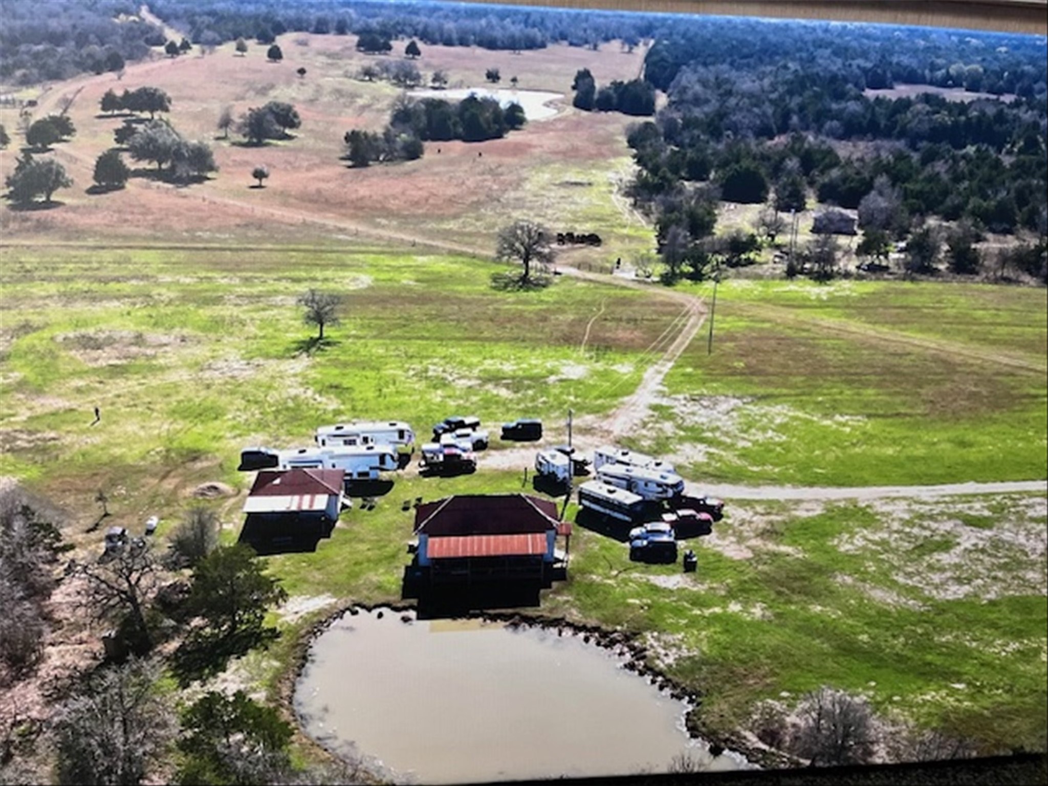 2810 West Old Lockhart Road Muldoon, TX 78949 - Photo 5 of 42 Aerial view from front bldgs towards middle of property