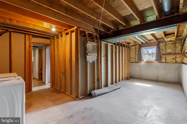a bathroom with a toilet and a sink