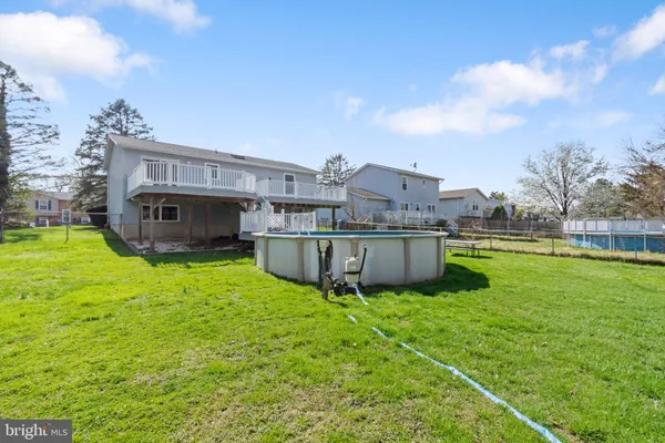 a view of deck with wooden floor and fence