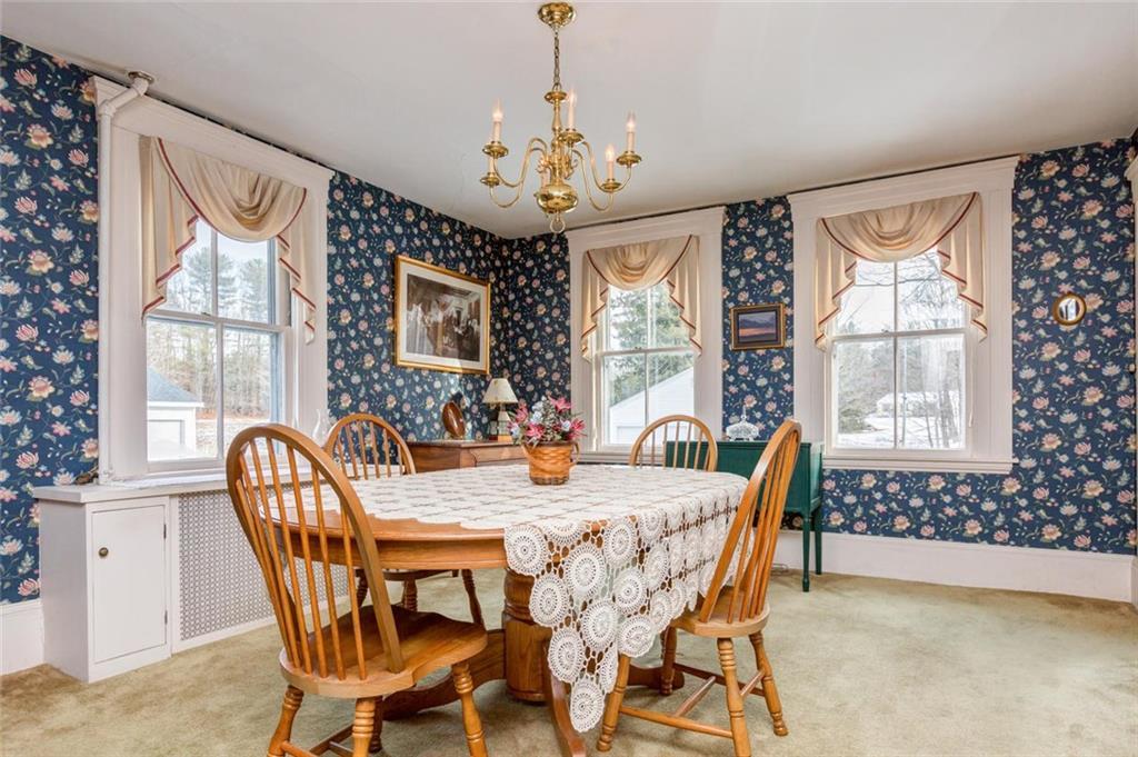 907 Duck Pond Road Westbrook, ME 04092 - Photo 7 of 35 The formal dining room exudes 19th...