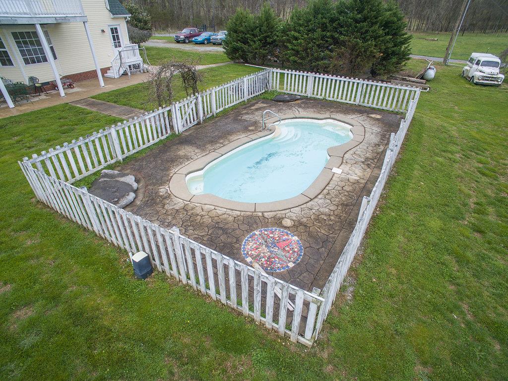 1028 Beach Bottom Road Watertown, TN 37184 - Photo 26 of 27 a view of a roof deck with wooden fence