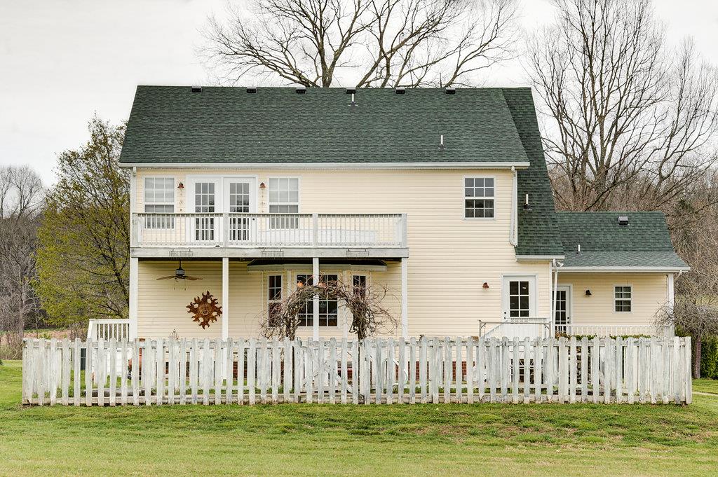1028 Beach Bottom Road Watertown, TN 37184 - Photo 3 of 27 a front view of a house with a garden
