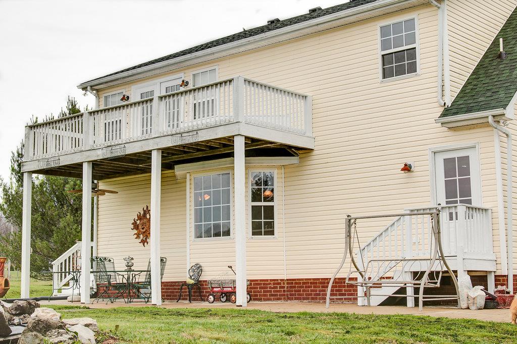 1028 Beach Bottom Road Watertown, TN 37184 - Photo 4 of 27 a view of a house with a yard and deck