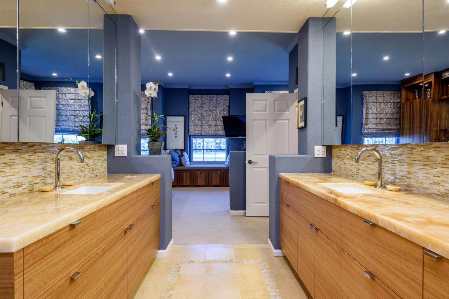 720 Promontory Point Lane, Unit 2106 Foster City, CA 94404 - Photo 21 of 35 a large kitchen with stainless steel appliances kitchen island granite countertop a large kitchen island a sink a stove and a refrigerator