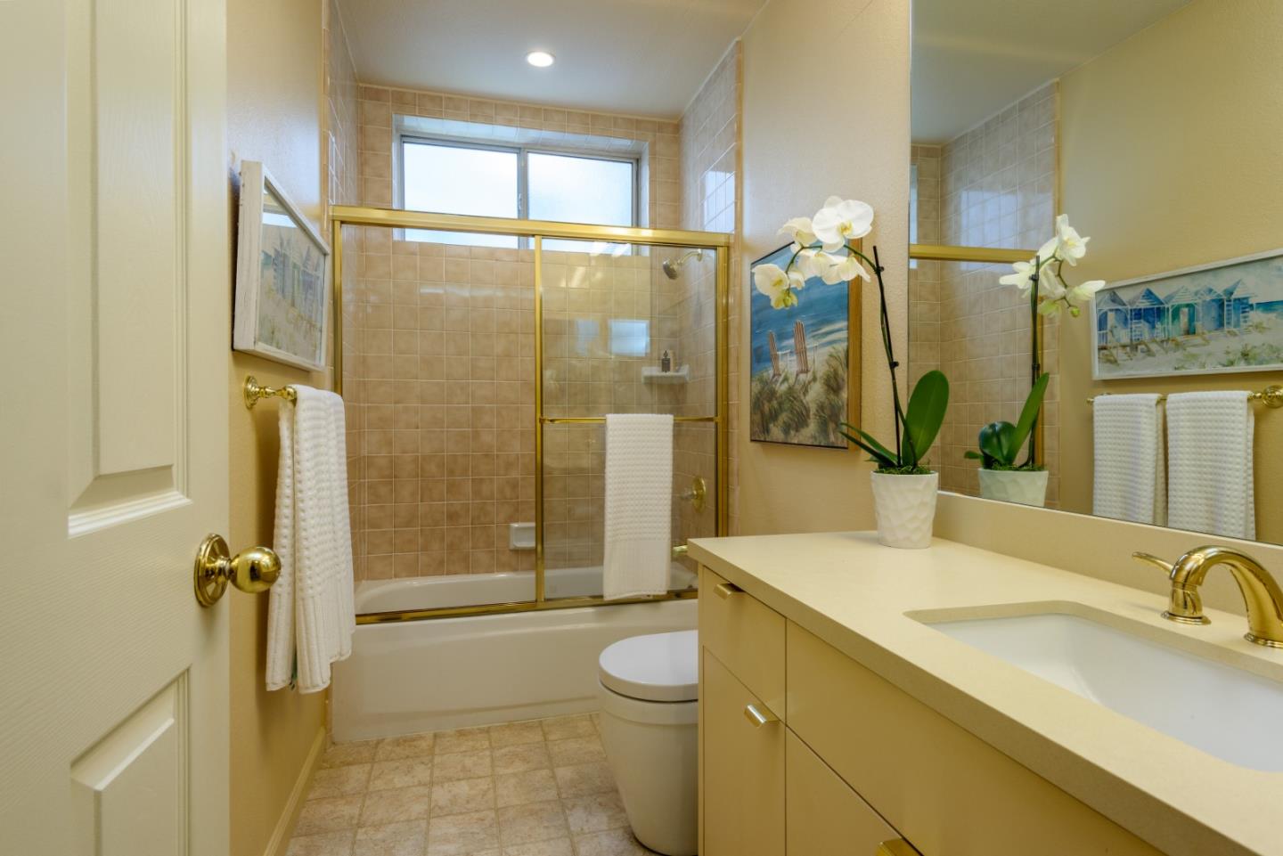 720 Promontory Point Lane, Unit 2106 Foster City, CA 94404 - Photo 24 of 35 a bathroom with a granite countertop sink toilet and shower