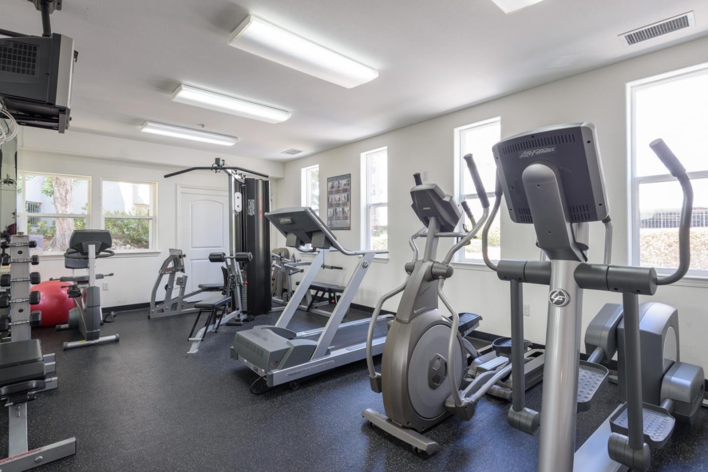 720 Promontory Point Lane, Unit 2106 Foster City, CA 94404 - Photo 32 of 35 a view of a room with gym equipment