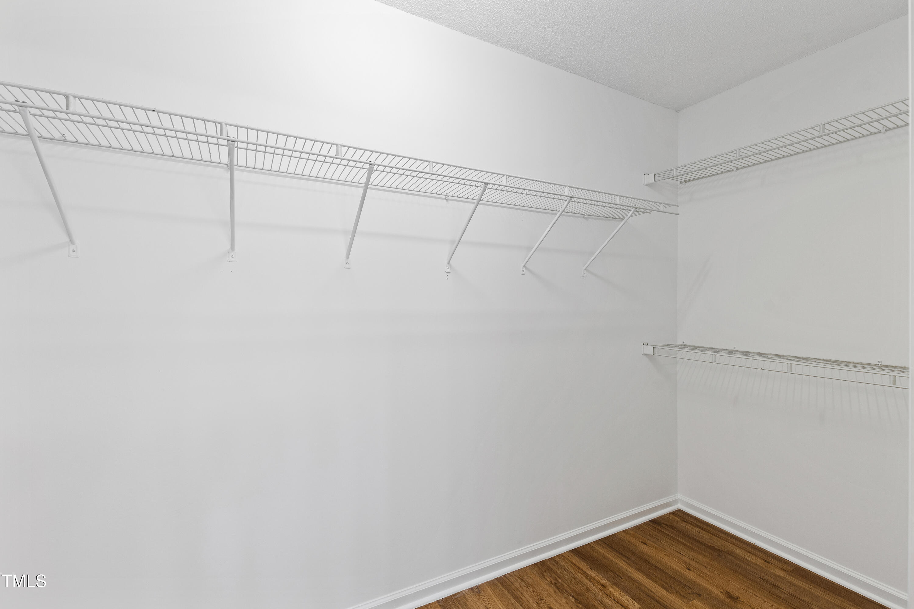 9724 Dansington Court Raleigh, NC 27615 - Photo 24 of 39 Walk-in Closet