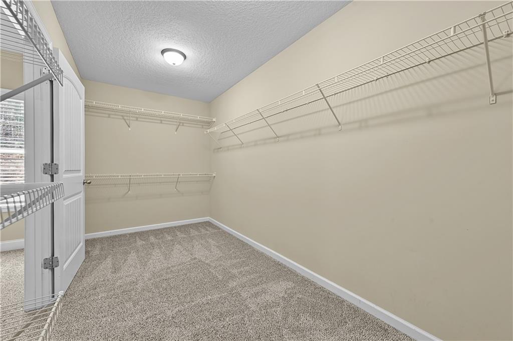 9 Bailee Circle Colbert, GA 30628 - Photo 17 of 30 a view of a room with racks on the wall