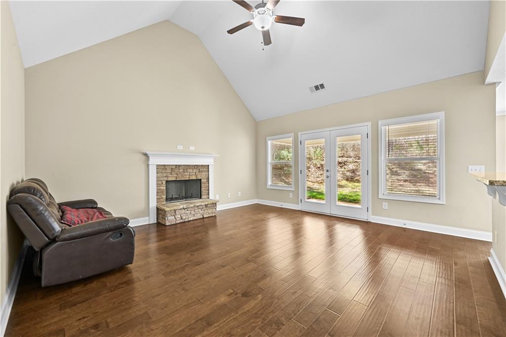 9 Bailee Circle Colbert, GA 30628 - Photo 6 of 30 a living room with furniture and a fireplace
