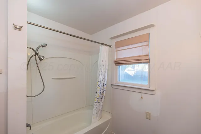 a bathroom with a bathtub