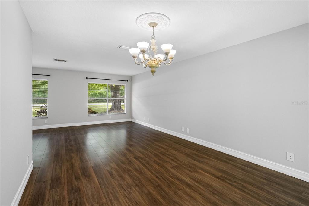 346 Ranch Road Tarpon Springs, FL 34688 - Photo 27 of 64 a view of an entryway with wooden floor